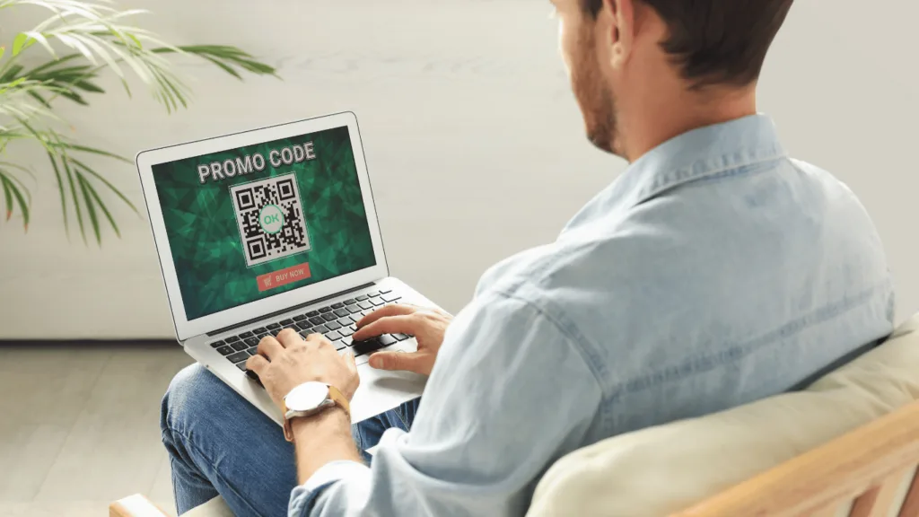 A person using a digital coupon to reduce cart abandonment