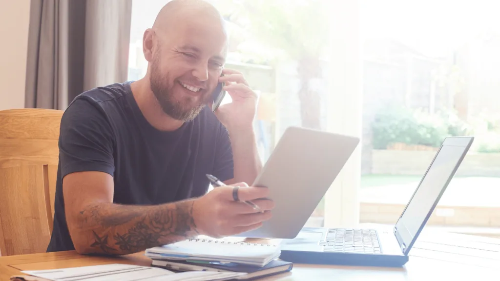 Customer satisfaction illustrated by a customer looking pleased during a customer support interaction