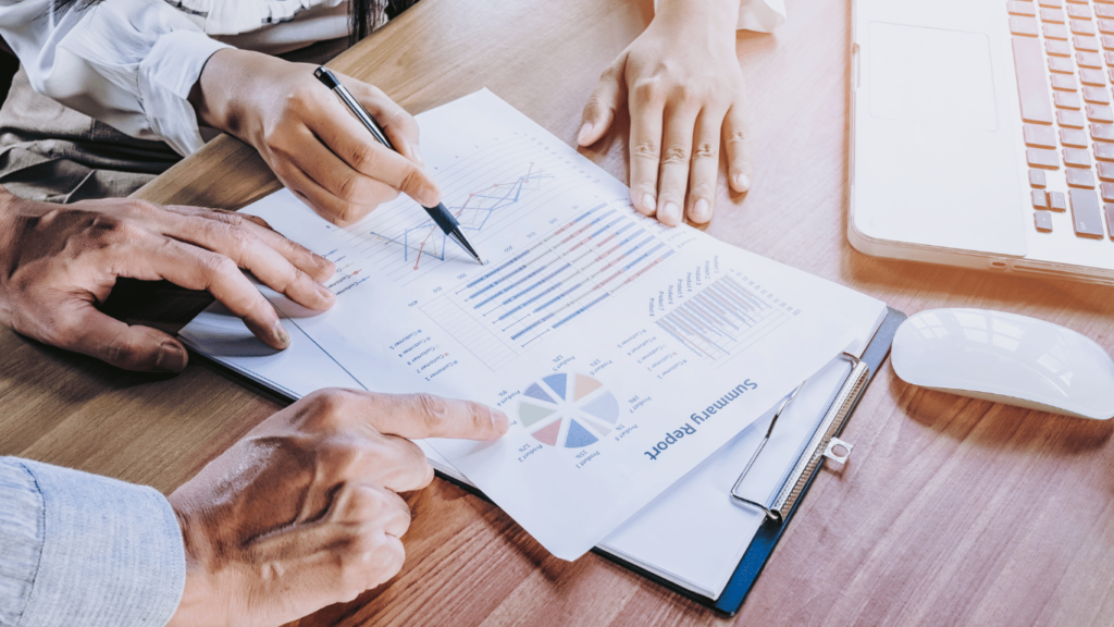 Customer success teams checking out customer data like churn rate and retention rate on their customer success software