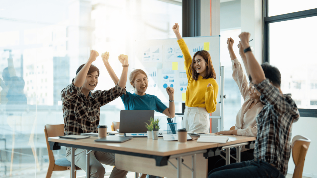 Customer success team discussing a checklist of items on how to create solid relationships while growing recurring revenue a helping SaaS companies achieve growth