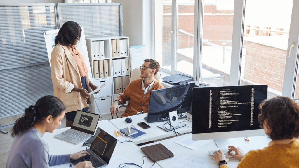 Internal team discussing how to decide on software solutions, specifically which one is the best knowledge base software to go with